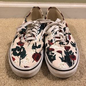 Vans, red roses with white flowers